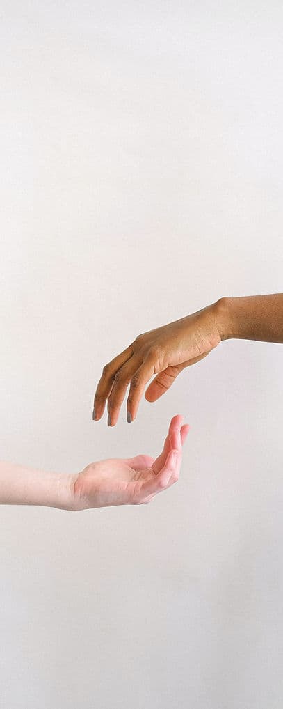 Hands reaching out in support and community giving